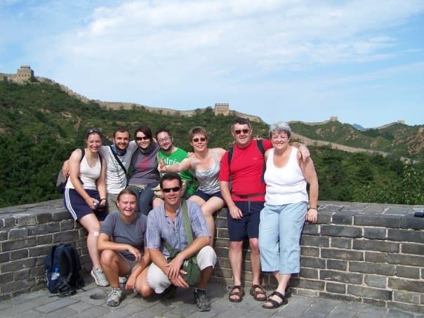 Luke guiding a tour group at the great wall of china